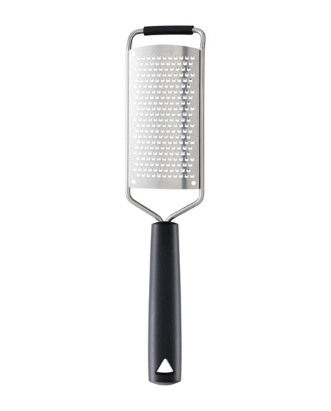 A metal cheese grater with a black handle and black grip, shown vertically against a plain white background.