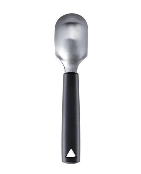 A metal fruit scoop with a black handle, shown vertically against a plain white background.