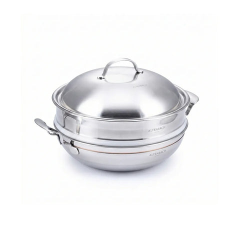Stainless steel pot with lid on a white background