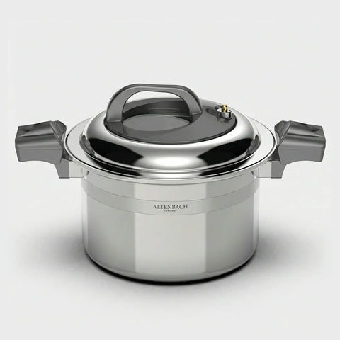 Stainless steel pot with lid on a light gray background