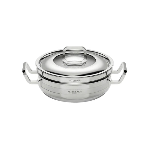 Stainless steel pot with lid on a white background