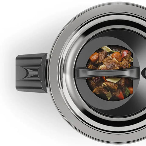 Stir-fry dish inside a pressure cooker lid on a white background