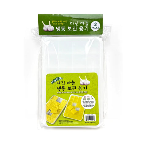 Packaged garlic freezer containers with green labels on a white background