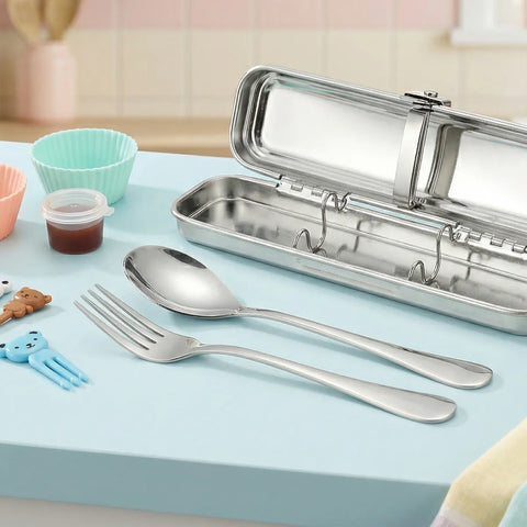 Stainless steel cutlery set with a carrying case on a light blue surface.