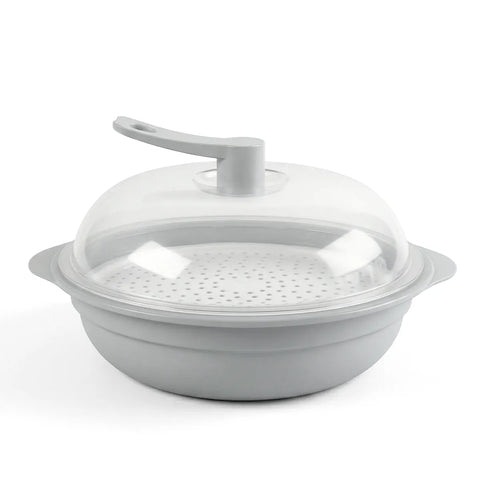 White silicone steamer basket with lid on a white background