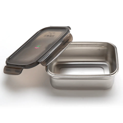 Stainless steel food container with a black lid on a white background