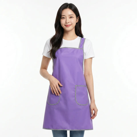 Woman wearing a purple apron on a white background