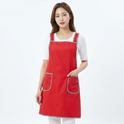 Person wearing a red apron with white background