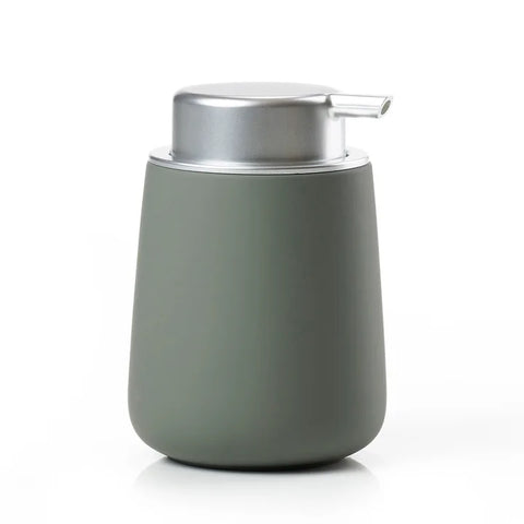 Matte green soap dispenser with silver pump on a white background