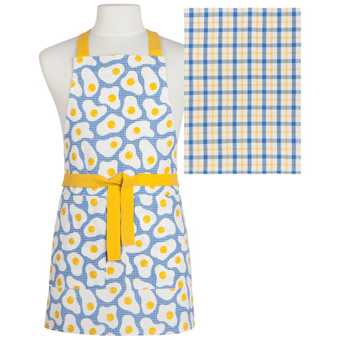Apron with yellow floral pattern and matching towel on a mannequin