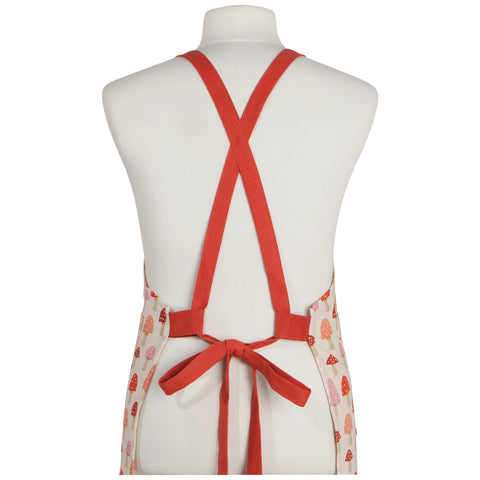 Red apron on a mannequin with a white background
