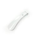White shoe shine tool on a white background