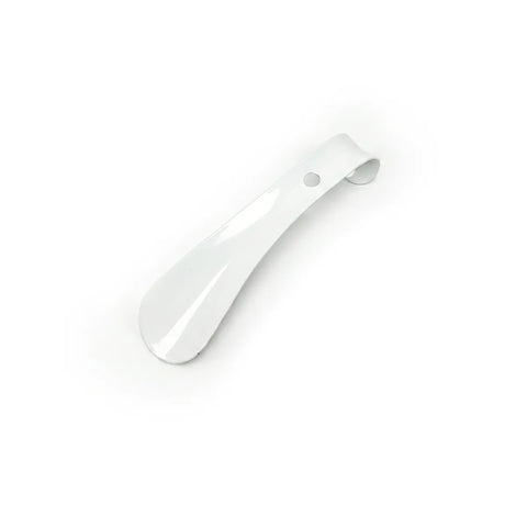 White shoe shine tool on a white background