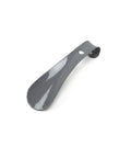 Gray shoe horn on a white background