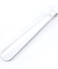White shoe horn on a white background