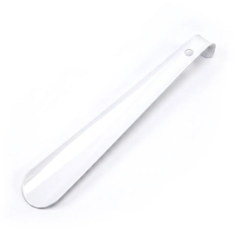 White shoe horn on a white background