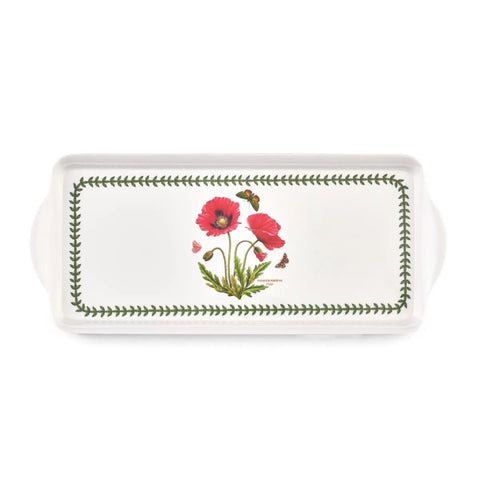 A white rectangular ceramic serving tray with side handles, featuring a botanical design of red poppies, green leaves, and butterflies, bordered by a green leaf pattern.