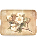 A rectangular decorative tray with rounded corners and integrated side handles, featuring a vintage-style floral print of white magnolia blossoms with green leaves on a distressed beige background.