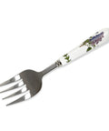 A serving fork with a polished silver metal head and a white ceramic handle decorated with a purple floral and green leaf pattern, shown on a plain white background.