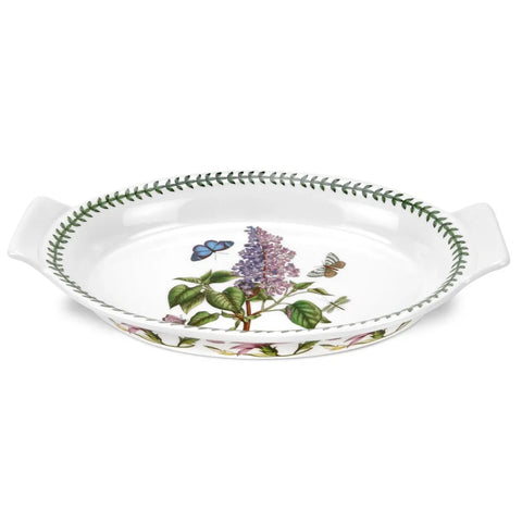 Decorative white dish with floral and butterfly design on a white background
