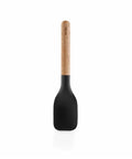 Black spatula with wooden handle on a white background