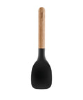 Black spatula with wooden handle on a white background