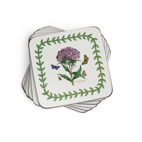 Set of square coasters with floral design on a white background