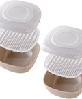 Two beige and white silicone dish drying racks shown on a plain white background.