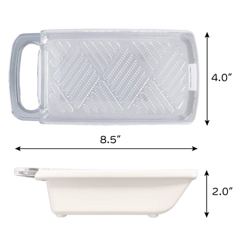 A clear rectangular radish grater with a handle is shown from two angles with dimension arrows and labels: 8.5 inches long, 4 inches wide, 2 inches tall.
