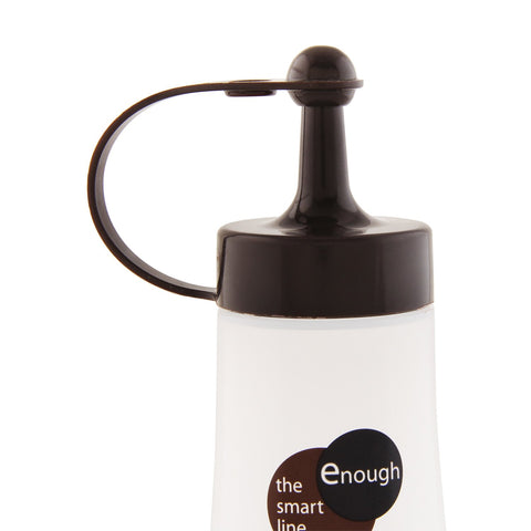 Close-up of a squeeze bottle with a frosted white body, a glossy brown cap and handle, and a visible enough brand label on a white background.