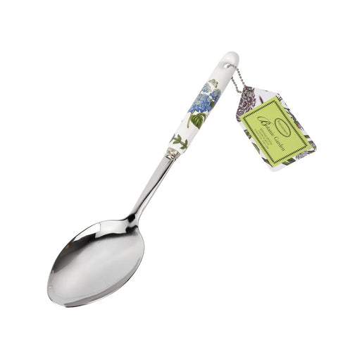 Spoon with floral handle and packaging on a white background