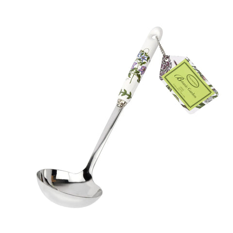 Serving spoon with floral handle and decorative tag on a white background