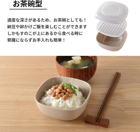 Japanese text at the top and a product photo below showing a small beige ceramic tea bowl filled with white rice, topped with beans and green garnish, with chopsticks and a wooden bowl in a tabletop setting.