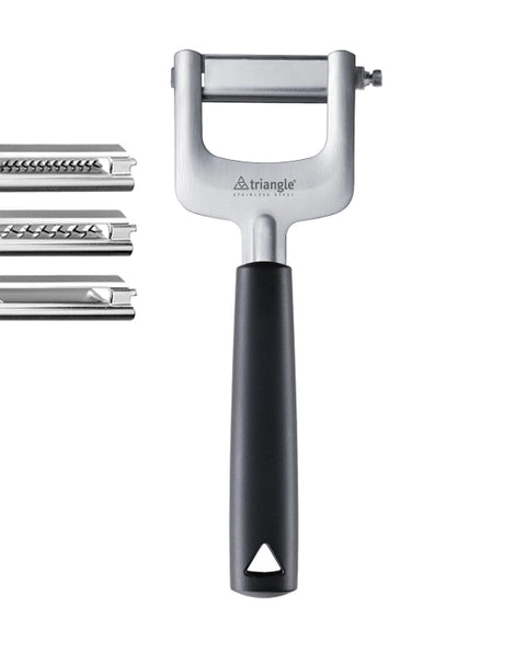 Triangle manual vegetable peeler with a black handle and silver metal body, shown with three interchangeable metal scraping attachments on a white background.