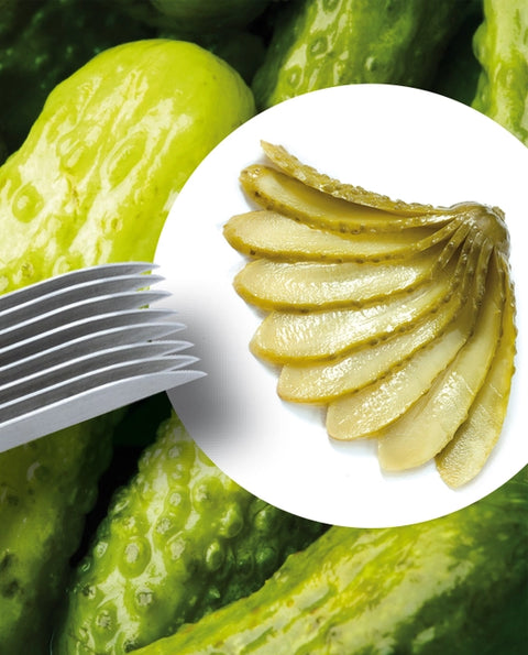 Green pickles with a gherkin slicer and sliced pickles on a white background