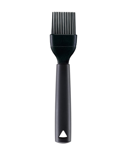 Black silicone and plastic pastry basting brush on a white background.