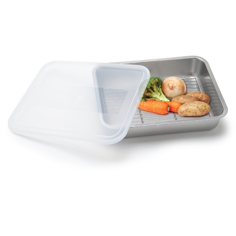 Metal food storage tray with vegetables and a white lid on a white background