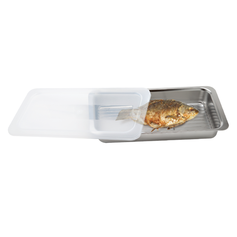 Fish on a metal food container tray with a plastic lid on a white background