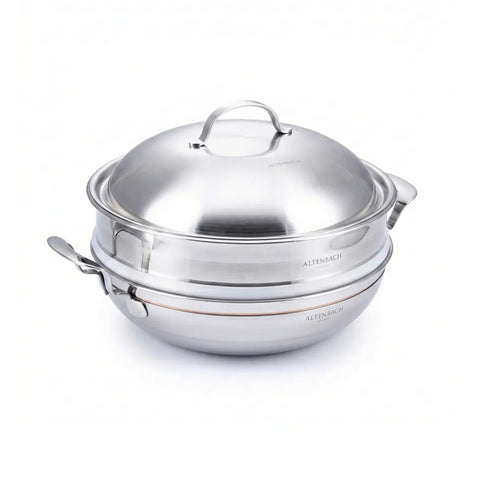 Stainless steel pot with lid on a white background