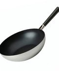 Black frying pan wok with a silver base on a white background