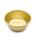 Gold bowl on a white background