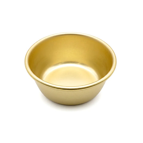Gold bowl on a white background