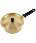 Gold-colored saucepan with a black handle on a white background