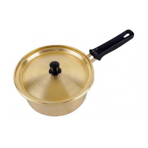 Gold-colored saucepan with a black handle on a white background