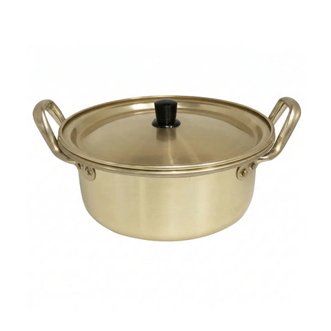 Gold-colored pot with a lid on a white background