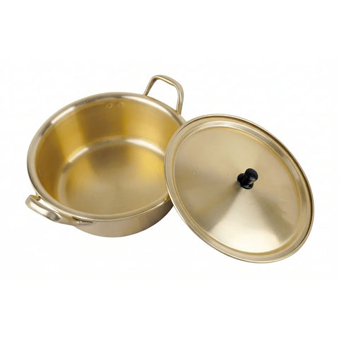 Gold pot with lid on a white background