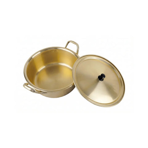 Gold pot with lid on a white background