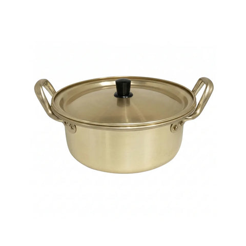Gold-colored pot with a lid on a white background