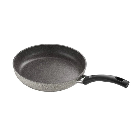 Gray frying pan with a black handle on a white background