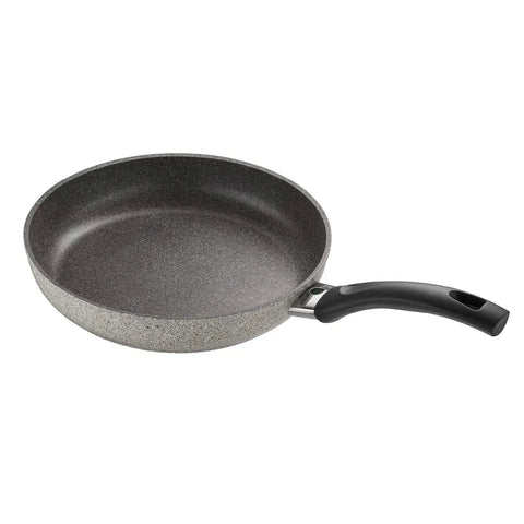 Gray frying pan with a black handle on a white background